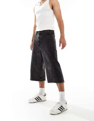 Weekday Weekday Twist low waist cropped jeans with raw hem in black acid wash