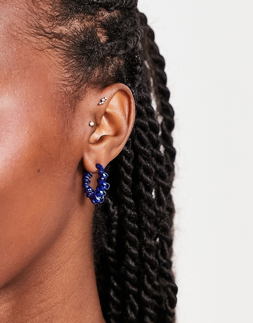 Weekday twisted hoop earrings in blue metallic