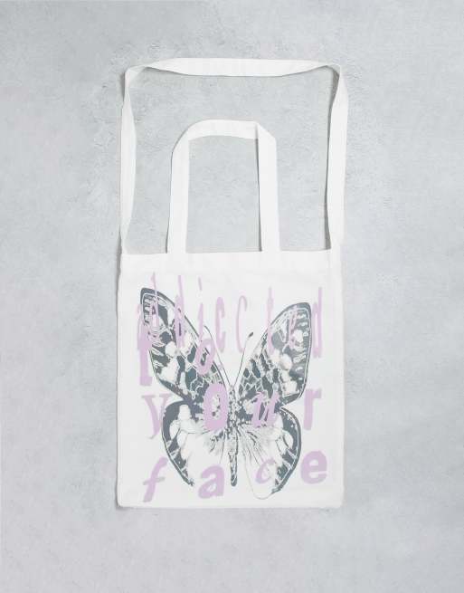 Weekday - Uniseks tote met vlindervormige print in beige, exclusief bij ASOS