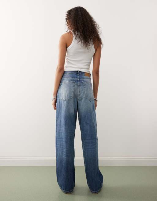 Weekday Unisex Astro loose fit wide leg jeans in faded dark blue wash