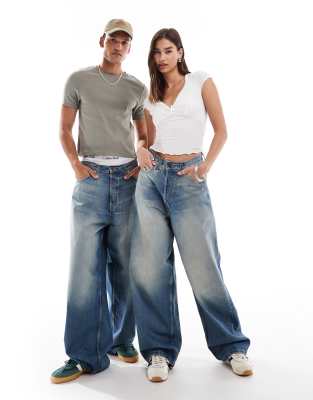 Unisex Astro loose fit wide leg jeans in streaky blue wash