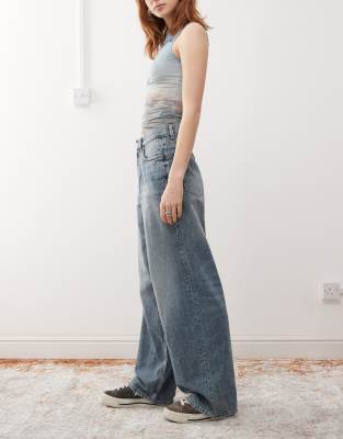 Weekday Unisex Astro low rise baggy jeans in worn blue wash