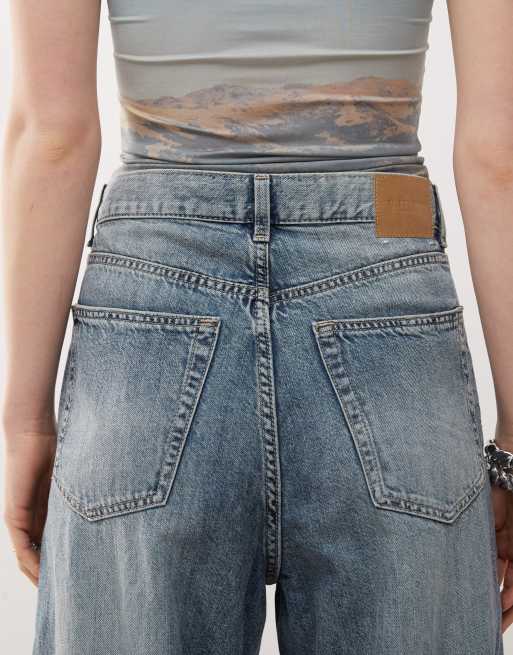 Weekday Unisex Astro low rise baggy jeans in worn blue wash