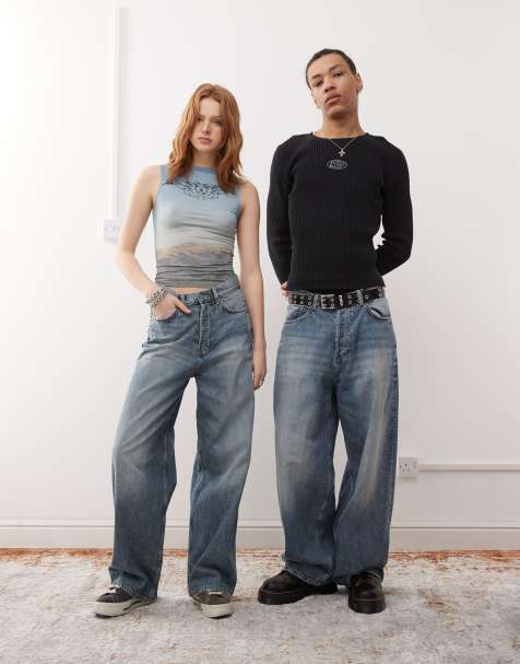 Weekday – Unisex – Astro – Weite Jeans in blauer Used-Waschung mit niedrigem Bund - view 1