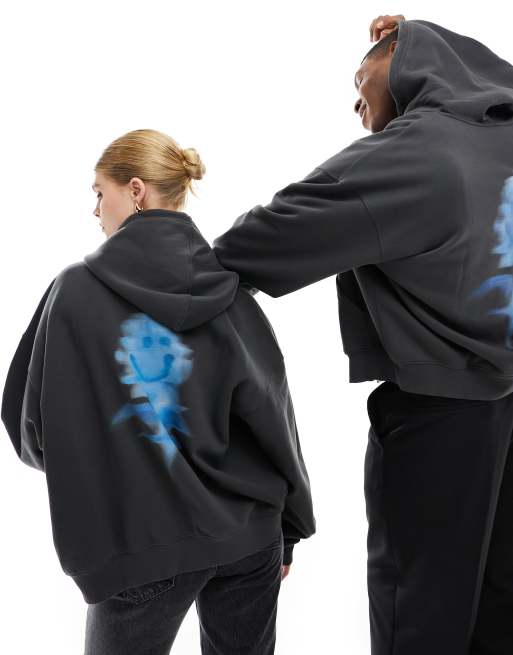 Weekday Unisex – Svarttvättad hoodie med dragkedja och suddigt blommönster, exklusivt hos ASOS