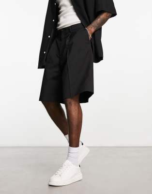Weekday Uno loose fit tailored shorts in black - ASOS Price Checker