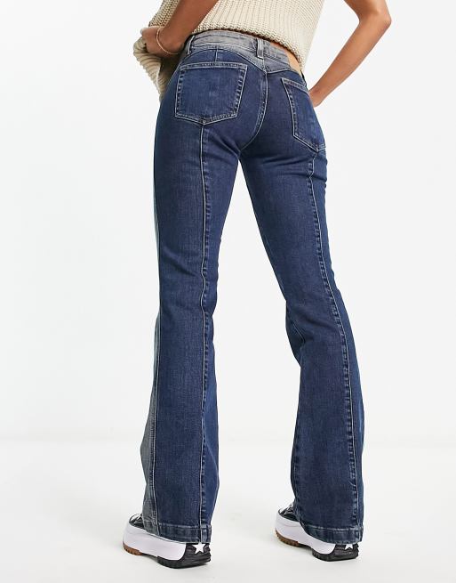 Weekday – Utopia – Ausgestellte Jeans mit niedrigem Bund und verwaschenen Einsätzen in Blau, 4 von 4