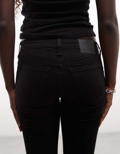 Weekday - vaqueros skinny flare de talle bajo en negro, 5 de 5