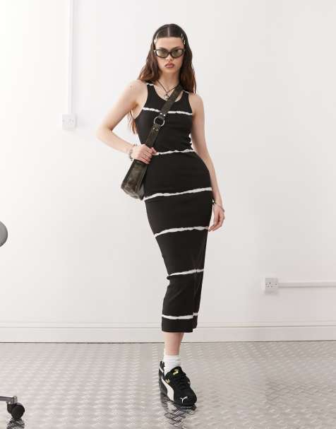 Weekday - Vestito al polpaccio aderente nero a coste con motivo tie-dye - In esclusiva per ASOS - view 1