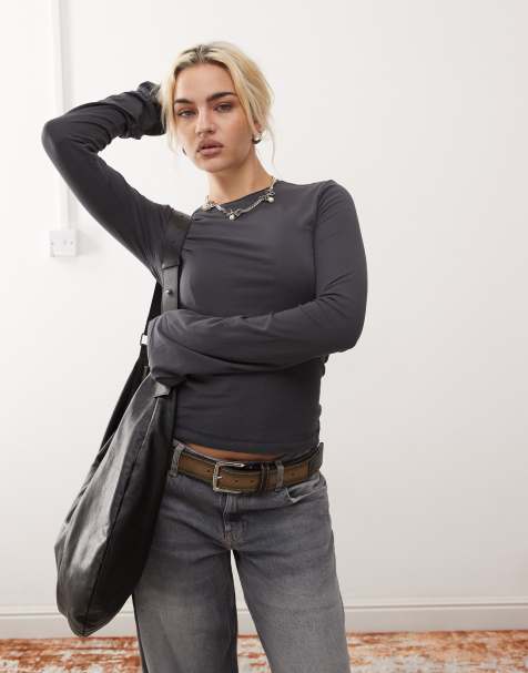Weekday Violet long bell sleeve top with roll neckline in washed black - view 1