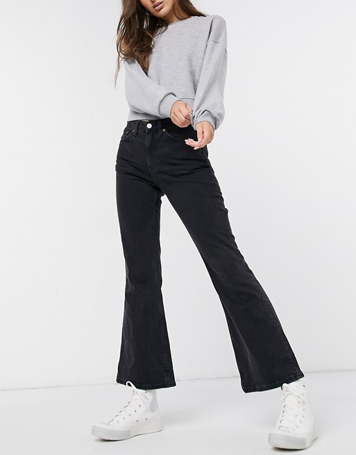 Weekday Wave flared jeans in black