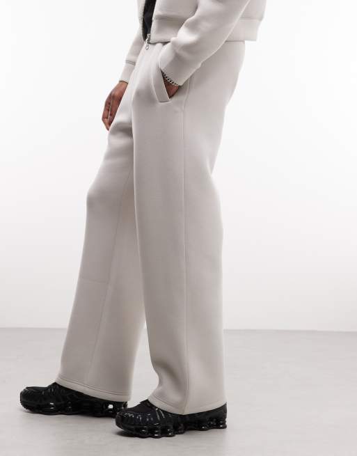 Weekday – Weit geschnittene Jogginghose aus Material in Neoprenoptik in Wollweiß, Kombiteil, 3 von 5