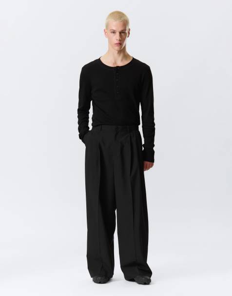 Weekday wide leg tailored trousers with front pleats in black