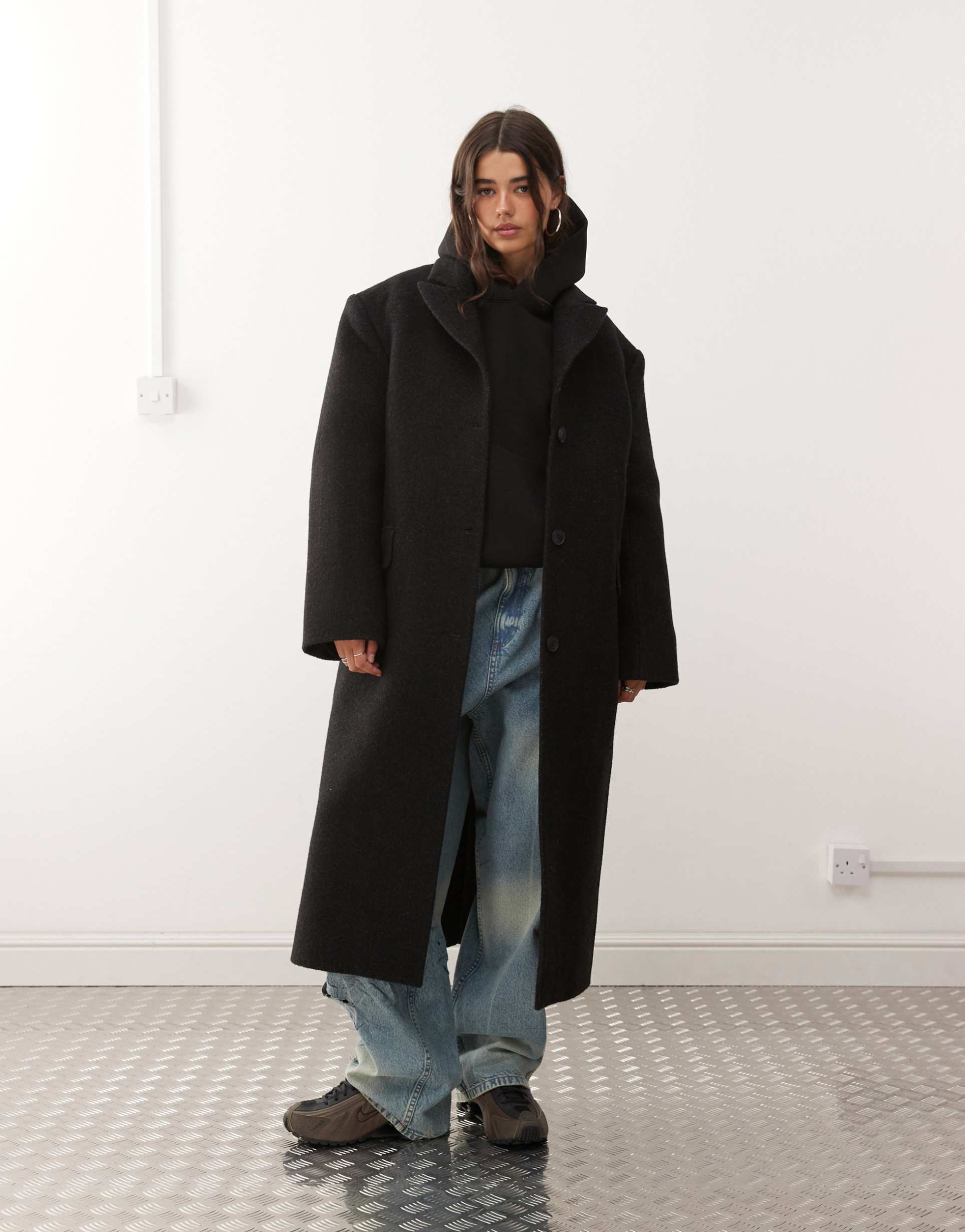 weekday wool blend oversized coat with exaggerated shoulders in black herringbone