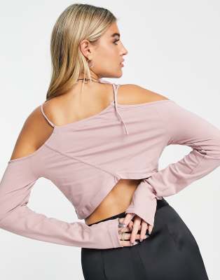 Weekday Zenia cutout long sleeve crop top in pale pink