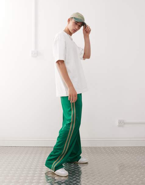 Weekday wide leg joggers with side tape detail in green