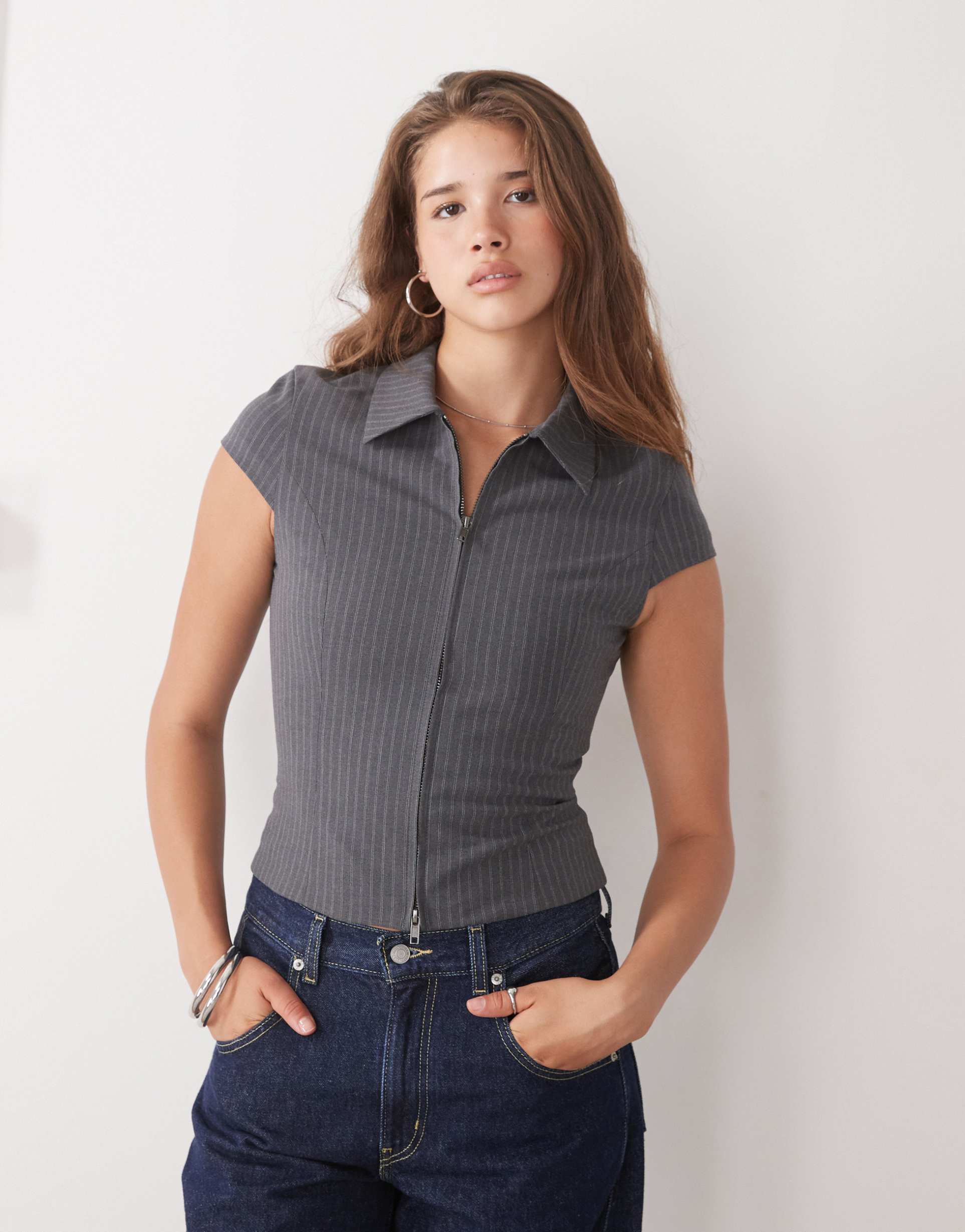 weekday zip through top with cap sleeves in dark gray pinstripe