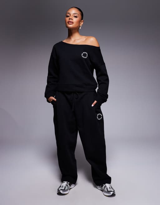 Weekend Collective barrel leg trackies with seam detail in black (Part of a set)