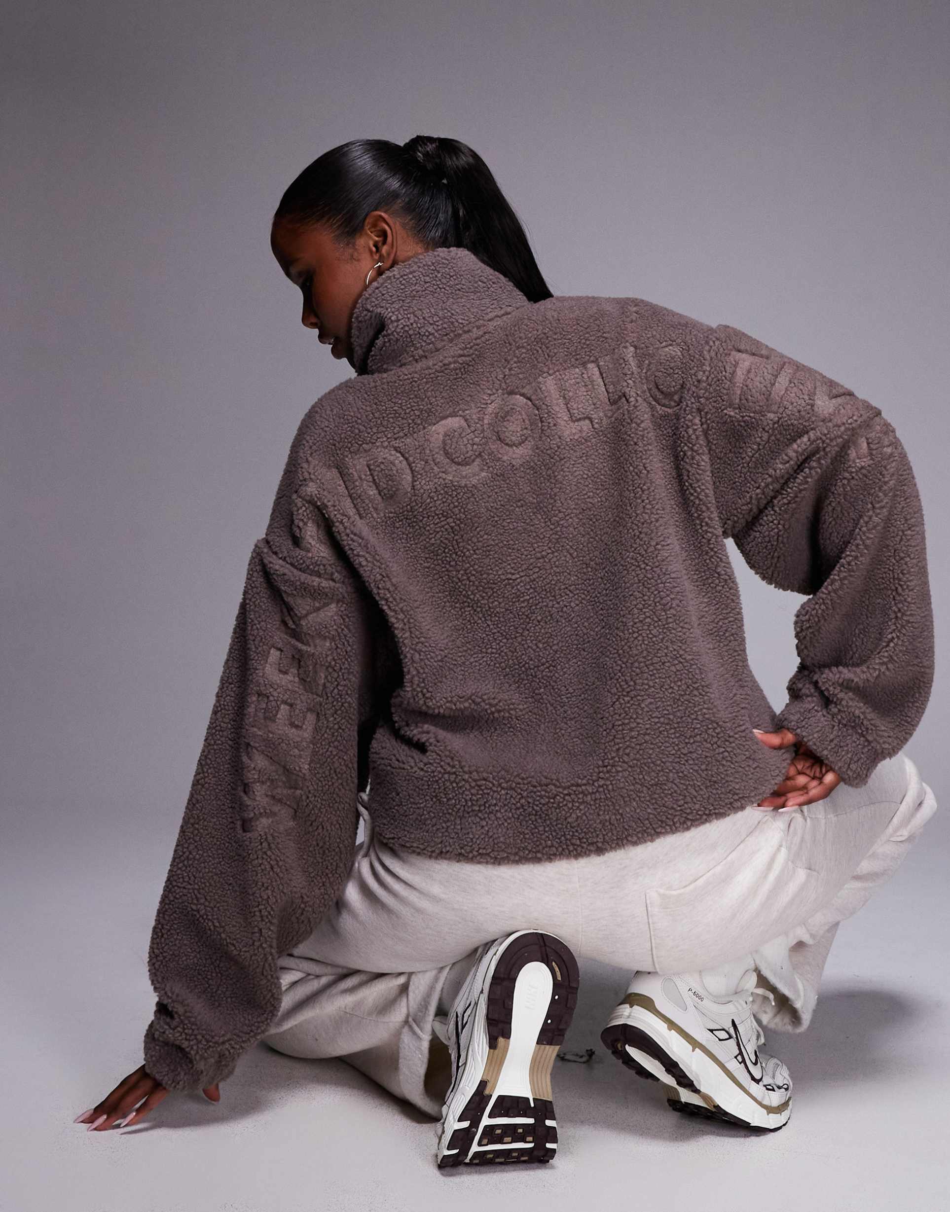 weekend collective borg half zip fleece with burnout graphic in taupe