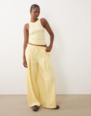Weekend Collective co-ord oversized barrel leg jogger with graphic in buttermilk