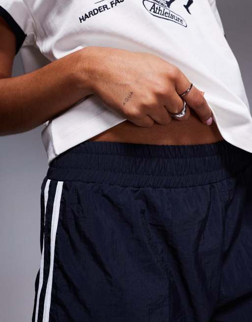 Weekend Collective co-ord short with chocolate runner graphic in navy, 2 of 5