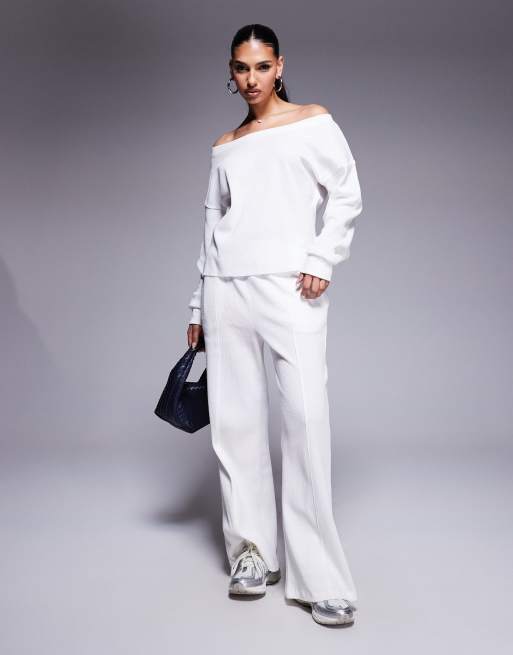 Weekend Collective - Coordinato in piqué color crema con top con spalle scoperte e joggers
