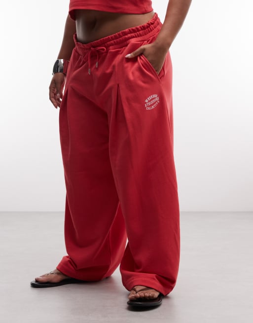 Weekend Collective Curve co-ord barrel leg joggers with graphic in red, 2 of 5
