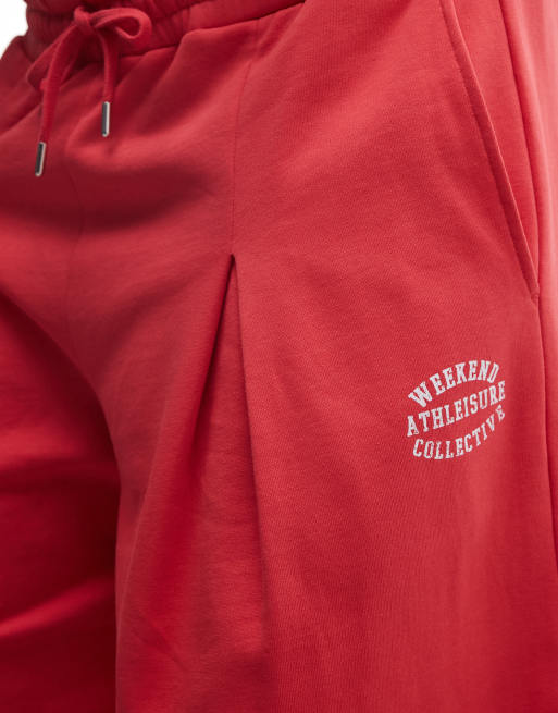 Weekend Collective Curve - conjunto oversize con pernera barrel y gráfico en rojo coral, 4 de 5