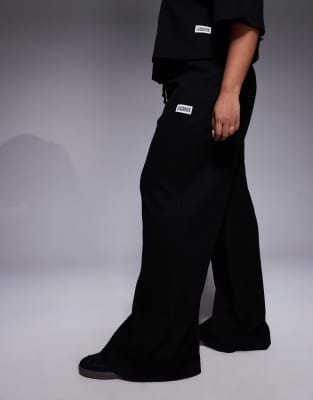 Asos Weekend Collective Weekend Collective Curve Wide Leg Waffle Pants With Nylon Trim In Black