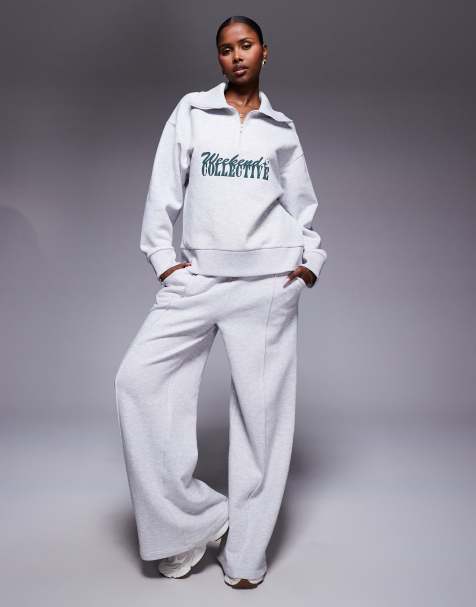 Weekend Collective - Gråmeleret sweatshirt med halv lynlås og grafik i forskellige skrifttyper - view 1