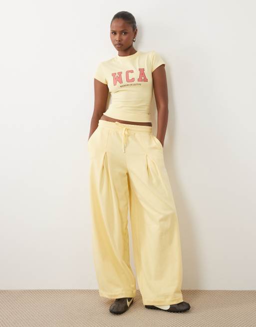 Weekend Collective Icon baby tee with WCA graphic in buttermilk, 2 of 4
