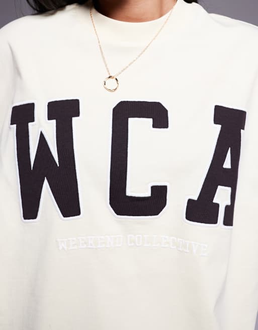 Weekend Collective - Icon - Kærnemælksgul oversized T-shirt med broderet 'WCA'-grafik, 3 af 4