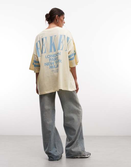 Weekend Collective Icon oversized t-shirt with stacked back logo in yellow with blue print, 2 of 4