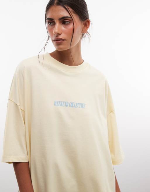 Weekend Collective Icon oversized t-shirt with stacked back logo in yellow with blue print, 3 of 4