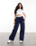 Weekend Collective - Joggingbroek van zware stof met wijde pijpen en imitatie-tailleband in marineblauw