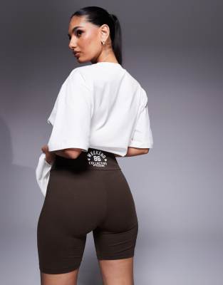 ASOS WEEKEND COLLECTIVE WEEKEND COLLECTIVE LEGGING SHORTS WITH HEART GRAPHIC 
