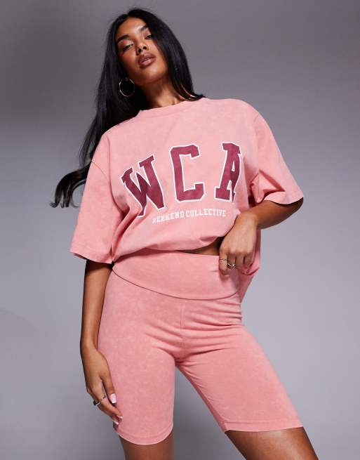 Weekend Collective legging shorts with running club graphic in washed peach (part of a set)