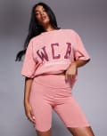 [ASOS Weekend Collective] Weekend Collective legging shorts with varsity graphic in washed peach (part of a set)-Orange XS Peach