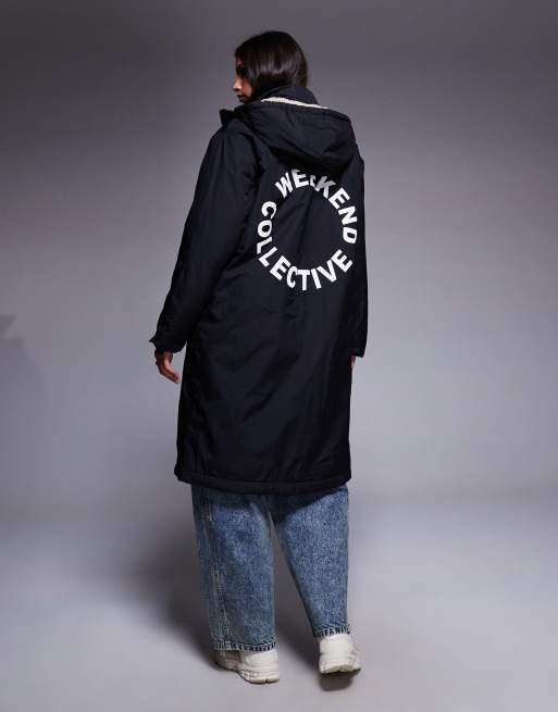 Weekend Collective longline coat with borg lining and graphic in black and cream, 2 of 4