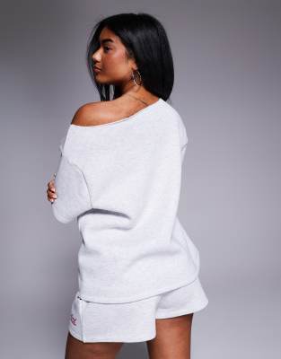 ASOS WEEKEND COLLECTIVE WEEKEND COLLECTIVE OFF THE SHOULDER SHORT SLEEVE SWEATSHIRT WITH SCRIBBLE LOGO 