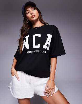 Weekend Collective - Oversize-T-Shirt in Schwarz mit aufgestickter „WCA"-Grafik