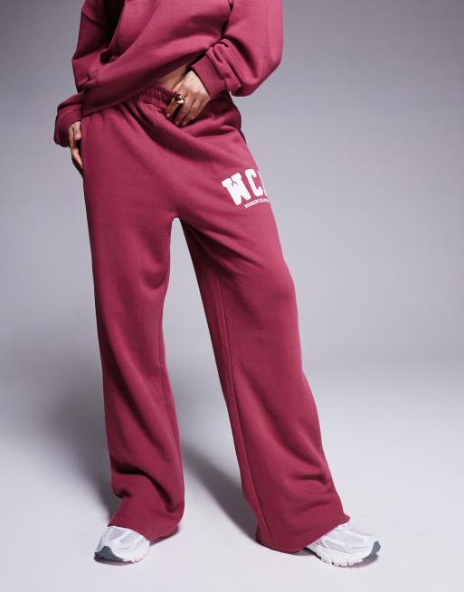 Weekend Collective oversized  jogger co-ord with varsity logo in plum, 2 of 5