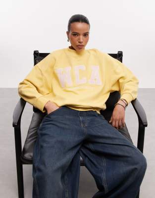 Asos Weekend Collective Weekend Collective Oversized Sweatshirt With Pink Varsity Logo In Yellow