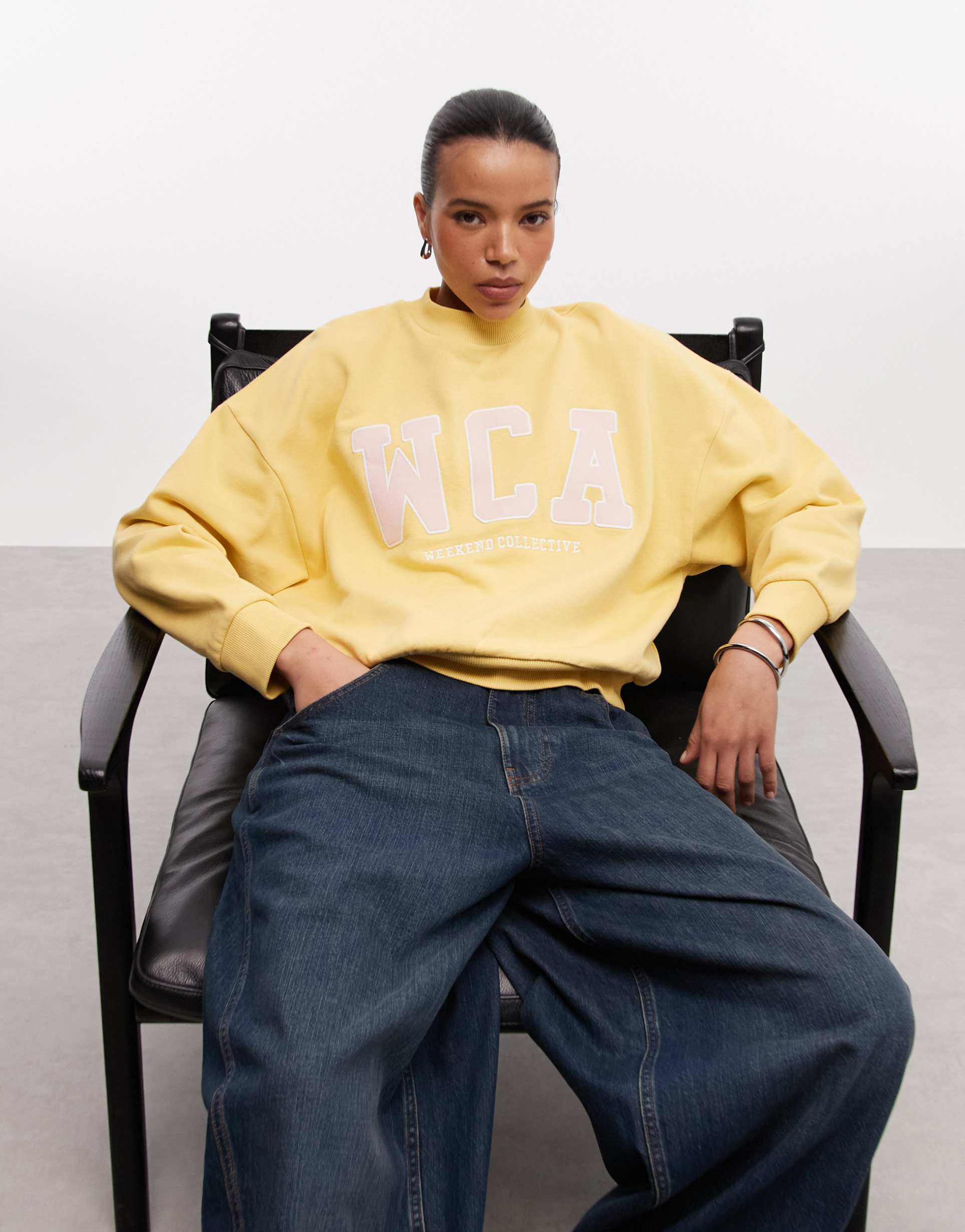 weekend collective oversized sweatshirt with pink varsity logo in yellow