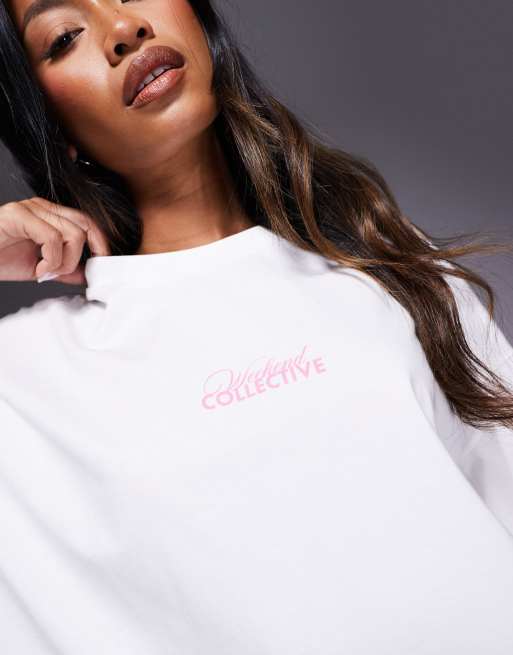 Weekend Collective oversized T-shirt with wellness travel graphic in coconut milk