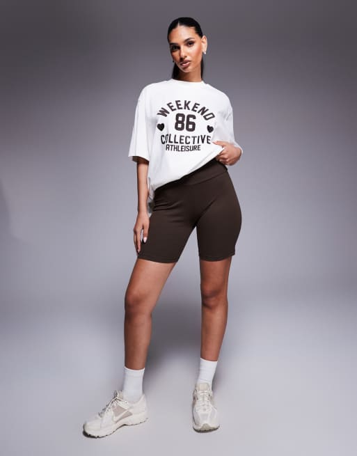 Weekend Collective - Pantaloncini leggings color cioccolato con grafica a cuore