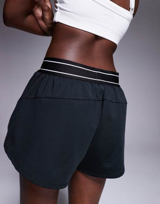 Weekend Collective running shorts in black with branded waistband, 5 of 5