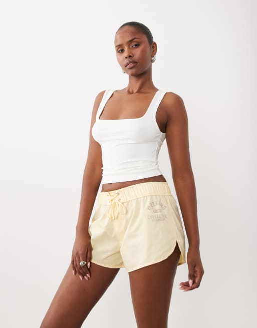 Weekend Collective short in micro nylon con vita annodata, color buttermilk