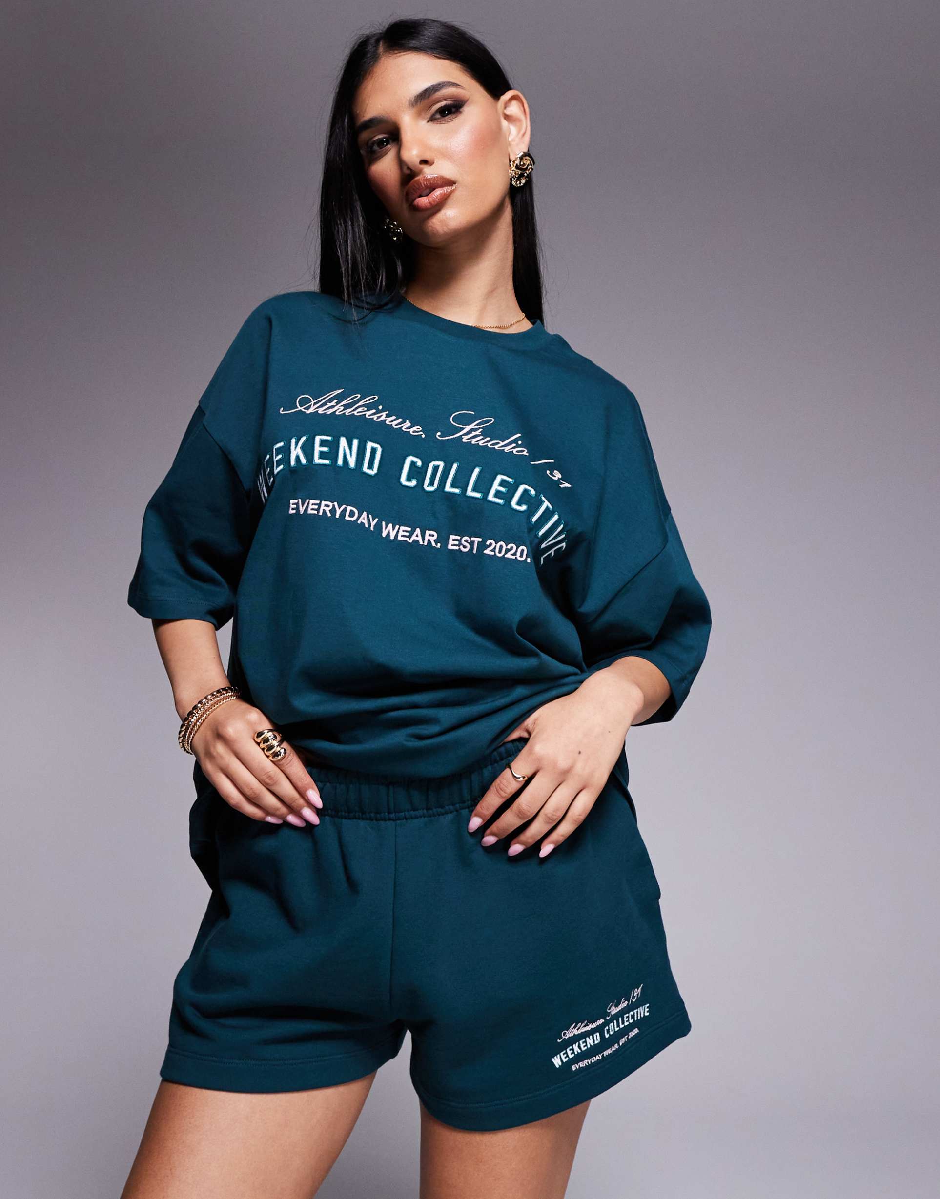 weekend collective shorts with embroidered logo in green - part of a set