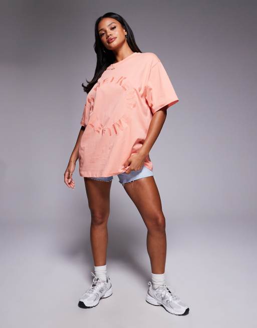 Weekend Collective T-shirt with circle graphic in peach